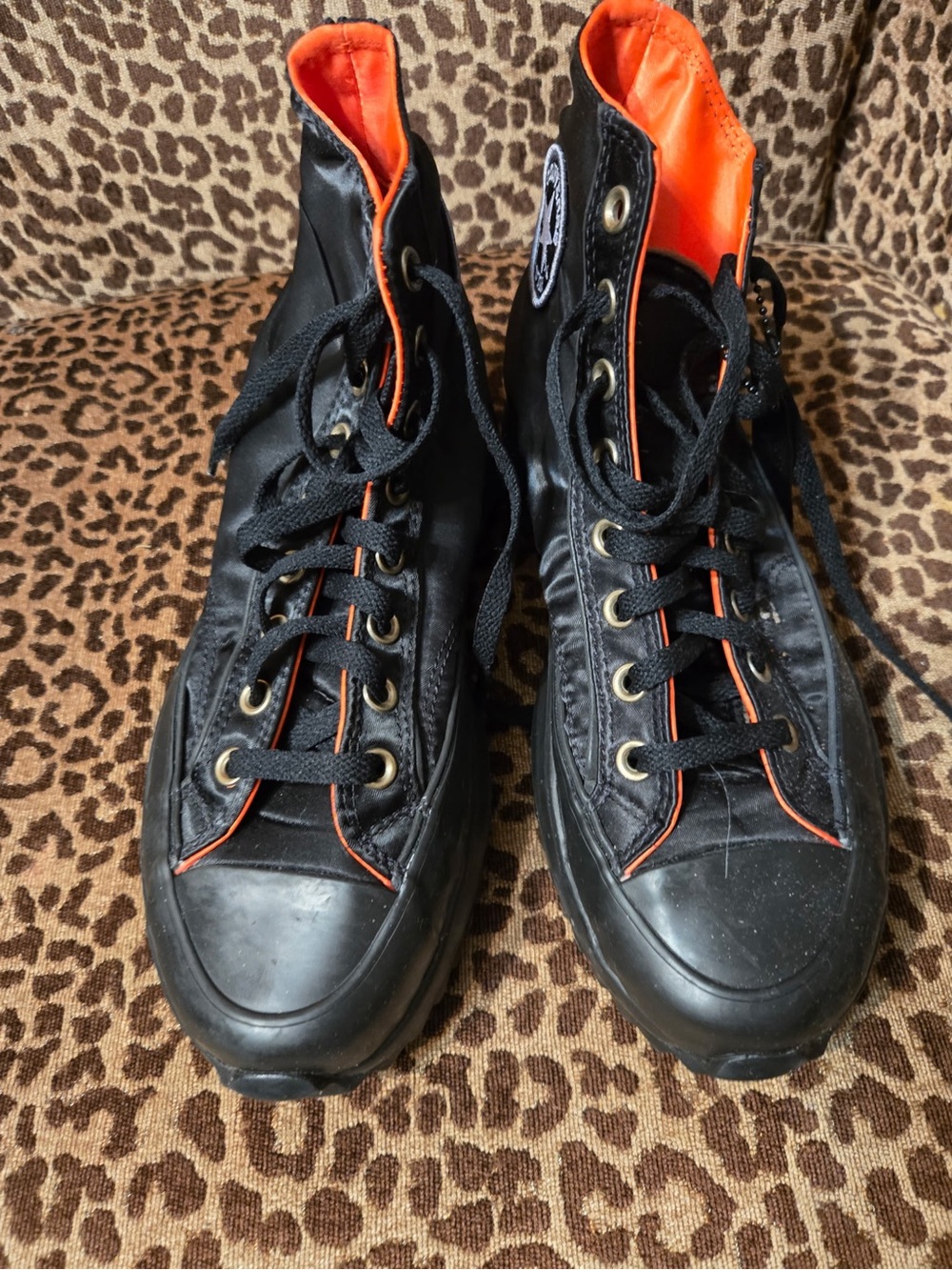 Converse Men’s Black High-Top Sneakers with Orange Accents